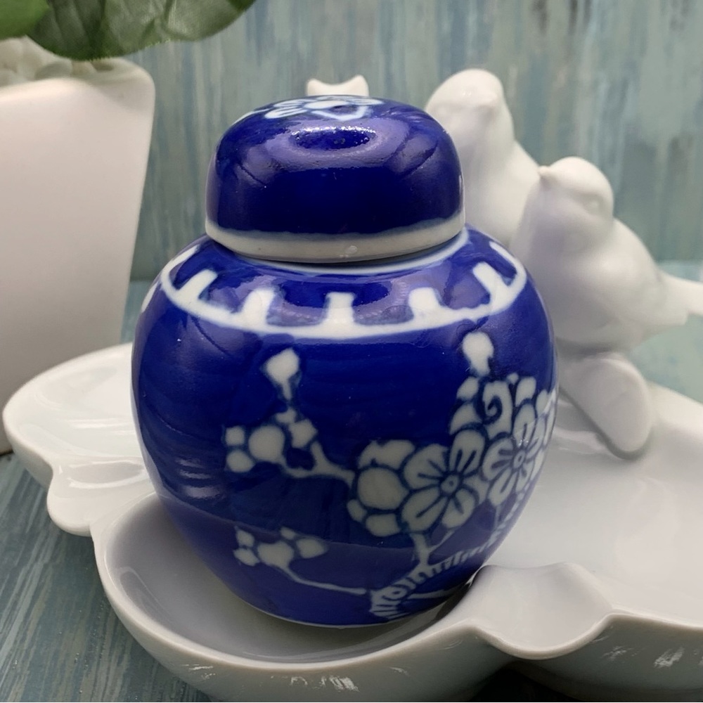 Tiny treasure.  Miniature Chinese pottery blue & white flower jar.